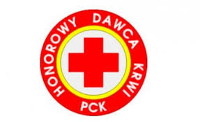 Czerwony krzyż na białym tle otoczony żółtą i czerwoną obręczą. Na czerwonej jest napisane Honorowy Dawca Krwi PCK